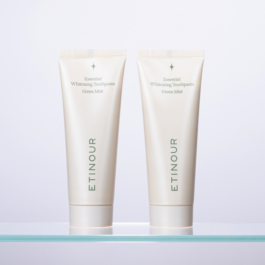 Essential_whitening_toothpaste_duo_kit_on_glass_shelf.png